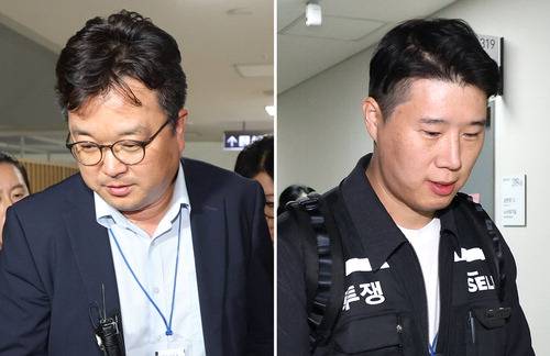 삼성전자 대표교섭위원인 김형로 부사장(왼쪽)과 최승호 초기업노조 삼성전자지부 위원장이 13일 새벽 정부세종청사 중앙노동위원회에서 올해 임금협약 체결을 위한 2차 사후조정이 결렬된 후 협상장을 떠나고 있다. 연합뉴스