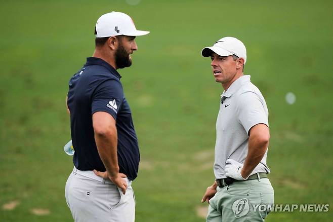 2024년 마스터스 대회에서 로리 매킬로이(오른쪽)와 욘 람 [AP=연합뉴스. 자료 사진