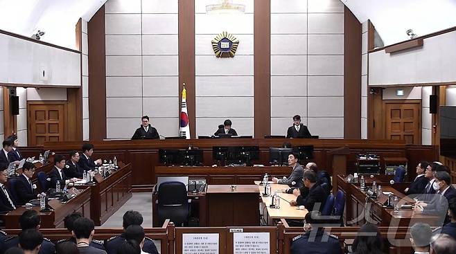 19일 오후 서울 서초구 서울중앙지방법원에서 윤석열 전 대통령의 12·3 비상계엄 관련 내란 우두머리 혐의 사건 1심 선고공판이 열리고 있다. (서울중앙지법 제공. 재판매 및 DB 금지) 2026.2.19 ⓒ 뉴스1