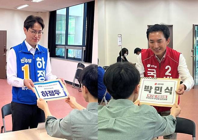 [부산=뉴시스] 이아름 기자 = 14일 부산 북구 선거관리위원회에 후보자 등록을 하고 있는 하정우 더불어민주당 후보(왼쪽)와 박민식 국민의힘 후보. 2026.05.14. aha@newsis.com *재판매 및 DB 금지