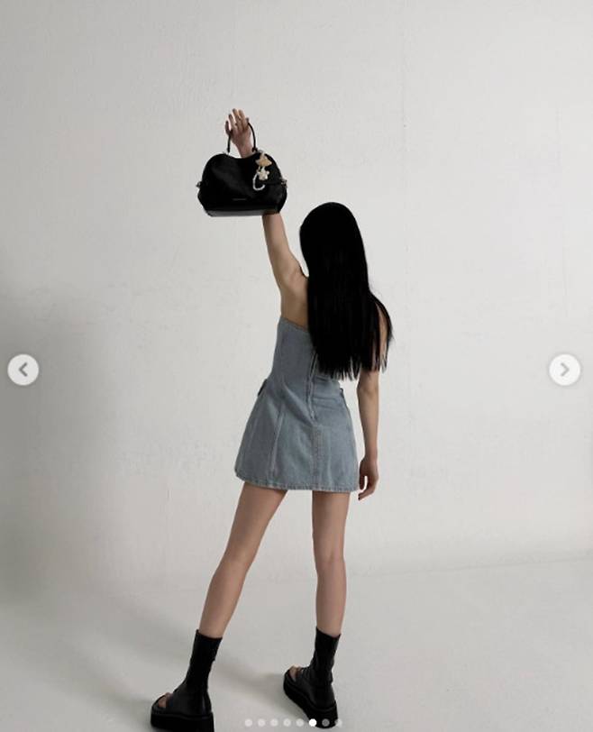 Actor Kim Yoo-jung shared updates on her personal account, showcasing her unchanging beauty and perfect figure even from unique camera angles. Wearing a denim mini dress, Kim Yoo-jung captivated viewers with various poses, including close-up selfies and shots taken from a top-down perspective.In the released photos, Kim Yoo-jung exuded an innocent vibe with her long, straight hair while adding a chic charm by matching it with a black bag. In particular, her distinct facial features and slender legs stood out, looking flawless from every angle.Fans reacted enthusiastically to Kim Yoo-jungs post, expressing their delight at her recent updates. Kim Yoo-jung is currently preparing to star in her next project, the film Revenge Ghost (working title).