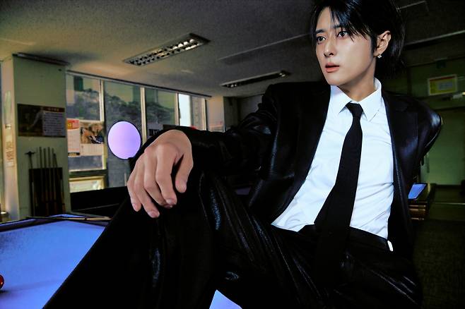 J.seph, a member of the group Card (Cardigan), has begun preparations for his full-scale comeback by releasing concept photos for his first solo EP, Spin-off. In the photos, J.seph is seen wearing a black suit, exuding restrained charisma and chic charm, raising fans expectations.In the released photos, set against the backdrop of a billiards hall, J.seph strikes a sophisticated yet nonchalant pose, creating a more profound atmosphere. This album is the result of capturing J.sephs inherent identity and energy without reservation, and it is set to showcase a powerful musical color distinct from his previous image.J.seph plans to prove his capabilities as a solo artist by emphasizing his own unique flow rather than flashy embellishments. Much attention is focused on the new musical endeavors he will present through his first EP, Spin-off.