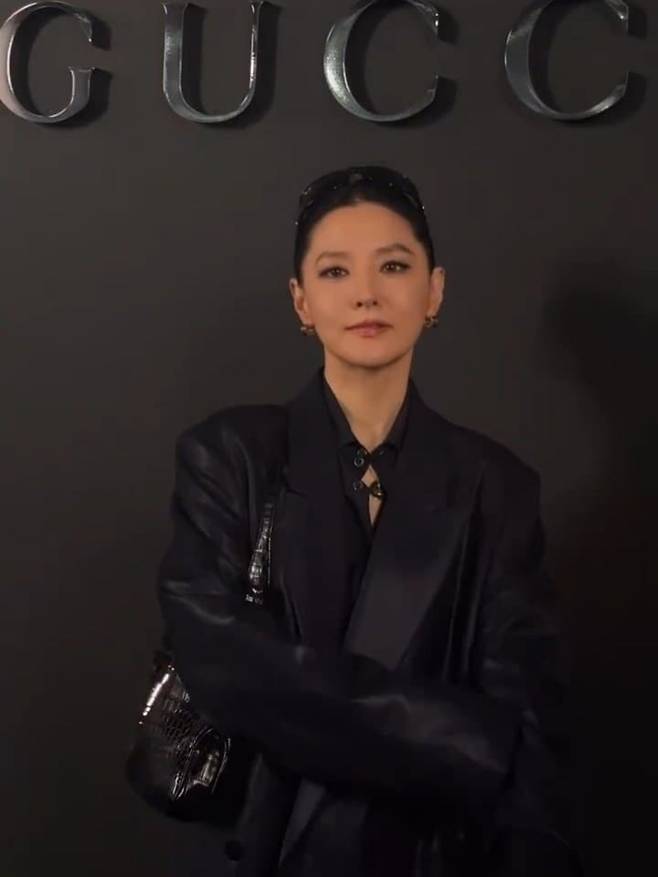 Actress Lee Yeong-ae attended a luxury brand event in New York, USA, showcasing her unchanging beauty and sophisticated all-black fashion. Lee Yeong-ae exuded alluring charm with smoky makeup and a bold styling that paired a leather jacket with a mini skirt.In the released photos, Lee Yeong-ae captivated attention with her youthful appearance, making it hard to believe she is 55 years old. In particular, her clear skin, contrasting with her all-black outfit, and her stylish use of accessories stood out.