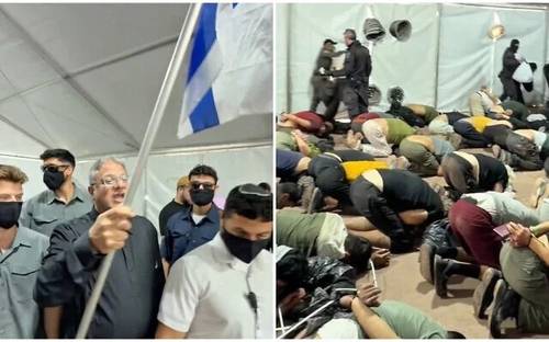 무릎을 꿇려진 채 바닥에 머리를 박고 있는 구호선 활동가들과 이스라엘 국기를 흔드는 이타마르 벤-그비르 국가안보장관.
[벤-그비르 장관 엑스 계정 캡처. 재판매 및 DB 금지]
