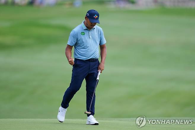 퍼트에 성공한 뒤 기뻐하는 김시우 [AP=연합뉴스]