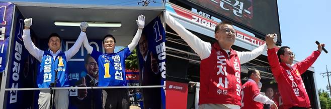 충주에서 유세중인 더불어민주당 신용한·맹정섭, 국민의힘 김영환·이동석 후보 [민주당·국민의힘 제공. 재판매 및 DB 금지]