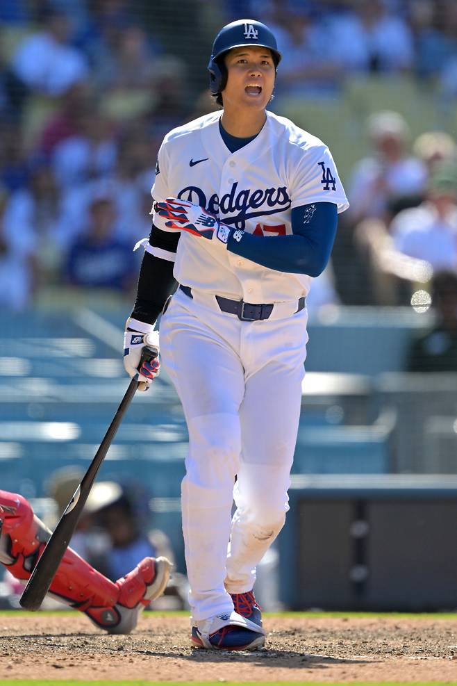 <yonhap photo-2992="">오타니가 8일(한국시간) LA 에인절스전 7회 말 타격하는 모습. AP=연합뉴스</yonhap>