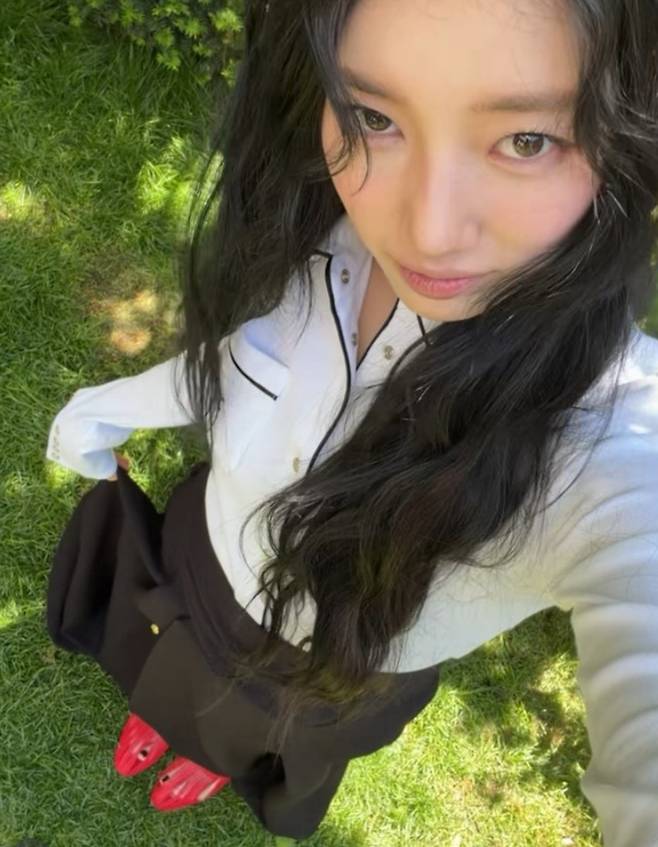 Singer and actress Bae Suzy captivated fans attention by showcasing flawless visuals in photos and videos posted on her social media. Song Hye-kyo and Lee Min-jung left comments on the post, revealing their special affection for Bae Suzy.On the 12th, Bae Suzy posted photos and videos on her account wearing a mini dress with a vibrant pattern. In particular, she flaunted her distinct features and unchanging innocent beauty even from a challenging angle looking up from below.Bae Suzy also added to her approachable charm by releasing a video showing her playfully sticking her toes out of her shoe. Upon seeing this, Song Hye-kyo expressed his affection with a heart emoji, while Lee Min-jung drew attention with a witty comment.Meanwhile, Bae Suzy is scheduled to continue her acting career by appearing in the Disney+ original series Bewitched, which is set to be released this year.