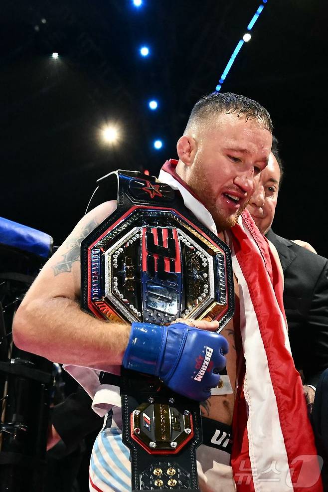 UFC 백악관 라이트급 통합 타이틀전에서 승리한 저스틴 게이치. ⓒ AFP=뉴스1