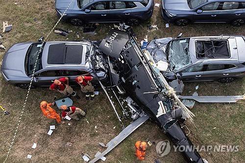 추락한 헬리콥터 [AFP=연합뉴스 제공]