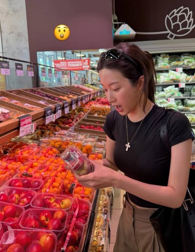 Actress Moon Ga-young shared an update on her personal social media account, showing herself shopping at a local supermarket in Europe. In the released photos, Moon Ga-young caught attention by revealing her slim figure in a comfortable outfit consisting of a black crop top and wide-leg pants.Moon Ga-young showcased a natural style by wearing sunglasses, boasting striking visuals even in her simple appearance. She garnered interest from fans by exuding a stylish vibe even in her ordinary daily life.Meanwhile, Moon Ga-young recently won the Best Actress Award in the film category at the 62nd Baeksang Arts Awards for her role in the movie *If We*. For her next project, she has confirmed her appearance in the new tvN drama *Whale Star* and is set to take on the challenge of acting in a period drama.