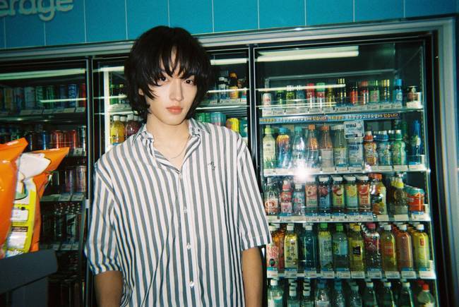 Rookie boy band AxMxP has exuded a fresh charm by releasing behind-the-scenes photos for their first digital single, Convenience Store Lights (24 Hours). FNC Entertainment captured the members natural daily lives through SHINS FILM, Roll 1, a set of behind-the-scenes photos personally taken by member Kim Shin.Set against the backdrop of a convenience store, the released photos complete a sophisticated aesthetic by adding the vintage color tones characteristic of film cameras. Member Kim Shin personally participated in the photo shoot, adding significance by capturing the vivid atmosphere of the location.Released on the 24th, Convenience Store Lights (24 Hours) is a song that blends bossanova rhythms with hip-hop R&B genres. Member Ha Yu-jun participated in writing the lyrics, infusing the song with AxMxPs unique musical color. The track delicately expresses the deepening emotions felt within daily life under the lights of a convenience store in the early morning. AxMxP plans to continue their active career as a next-generation band by taking the stage at the 2026 Palette Festival - Goyang in July and the 2026 Sound Planet Festival - Incheon in September.