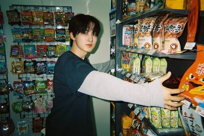 Rookie boy band AxMxP has exuded a fresh charm by releasing behind-the-scenes photos for their first digital single, Convenience Store Lights (24 Hours). FNC Entertainment captured the members natural daily lives through SHINS FILM, Roll 1, a set of behind-the-scenes photos personally taken by member Kim Shin.Set against the backdrop of a convenience store, the released photos complete a sophisticated aesthetic by adding the vintage color tones characteristic of film cameras. Member Kim Shin personally participated in the photo shoot, adding significance by capturing the vivid atmosphere of the location.Released on the 24th, Convenience Store Lights (24 Hours) is a song that blends bossanova rhythms with hip-hop R&B genres. Member Ha Yu-jun participated in writing the lyrics, infusing the song with AxMxPs unique musical color. The track delicately expresses the deepening emotions felt within daily life under the lights of a convenience store in the early morning. AxMxP plans to continue their active career as a next-generation band by taking the stage at the 2026 Palette Festival - Goyang in July and the 2026 Sound Planet Festival - Incheon in September.