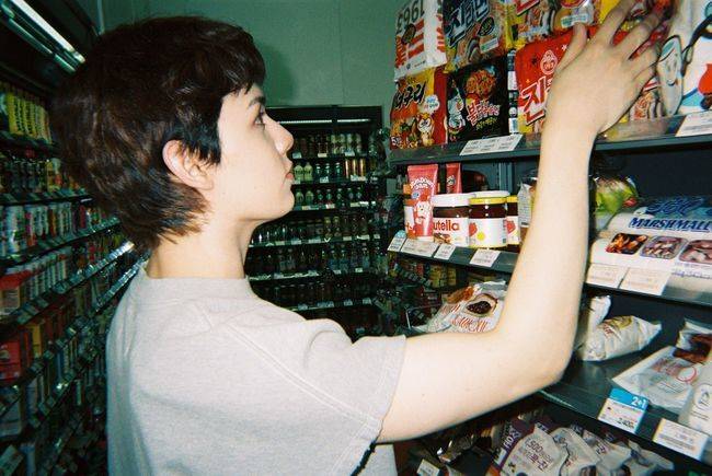 Rookie boy band AxMxP has exuded a fresh charm by releasing behind-the-scenes photos for their first digital single, Convenience Store Lights (24 Hours). FNC Entertainment captured the members natural daily lives through SHINS FILM, Roll 1, a set of behind-the-scenes photos personally taken by member Kim Shin.Set against the backdrop of a convenience store, the released photos complete a sophisticated aesthetic by adding the vintage color tones characteristic of film cameras. Member Kim Shin personally participated in the photo shoot, adding significance by capturing the vivid atmosphere of the location.Released on the 24th, Convenience Store Lights (24 Hours) is a song that blends bossanova rhythms with hip-hop R&B genres. Member Ha Yu-jun participated in writing the lyrics, infusing the song with AxMxPs unique musical color. The track delicately expresses the deepening emotions felt within daily life under the lights of a convenience store in the early morning. AxMxP plans to continue their active career as a next-generation band by taking the stage at the 2026 Palette Festival - Goyang in July and the 2026 Sound Planet Festival - Incheon in September.