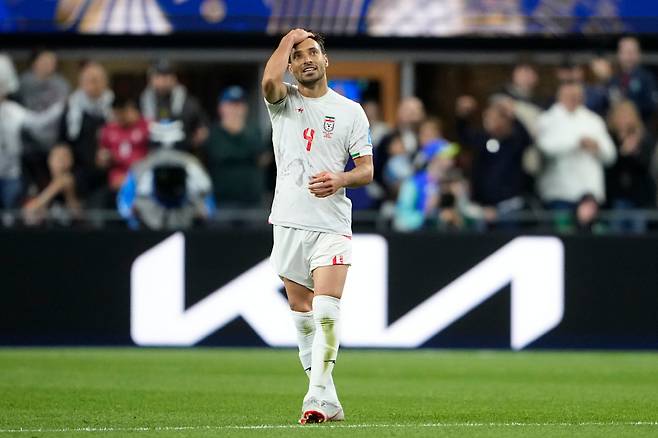 Iran's Shoja Khalilzadeh (4) reacts during the World Cup Group G soccer match between Egypt and Iran in Seattle, Friday, June 26, 2026. (AP Photo/Lindsey Wasson)







<저작권자(c) 연합뉴스, 무단 전재-재배포, AI 학습 및 활용 금지>