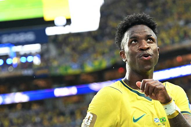 Brazil's forward #07 Vinicius Junior celebrates after scoring his team's second goal during the 2026 World Cup Group C football match between Scotland and Brazil at the Miami Stadium in Miami Gardens on June 24, 2026.  (Photo by CHANDAN KHANNA / AFP)  <저작권자(c) 연합뉴스, 무단 전재-재배포, AI 학습 및 활용 금지>