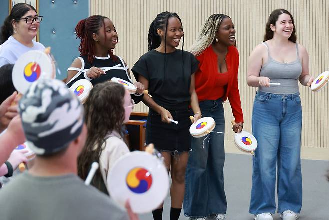 Students participate in a summer program at Pusan National University on Tuesday. (Yonhap)