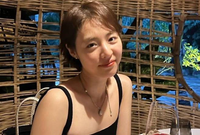 Actress Lee Yeon-hee shared a glimpse of her summer routine on her social media account, showing her spending quality time with her 2-year-old daughter. In the photo, Lee Yeon-hee is sitting with her daughter on her lap and smiling brightly; her daughter, who has grown significantly and takes after her mother, has drawn a lot of attention.Lee Yeon-hee married a non-celebrity in 2020 and has one daughter. She has previously expressed her love for her family by revealing her plans to have more children on television.Lee Yeon-hee also mentioned that she is working to balance her career and family life by sharing parenting tips with her fellow actress Choi Ji-woo. She is currently preparing to make her return to the small screen with her upcoming drama, Personal Taxi.