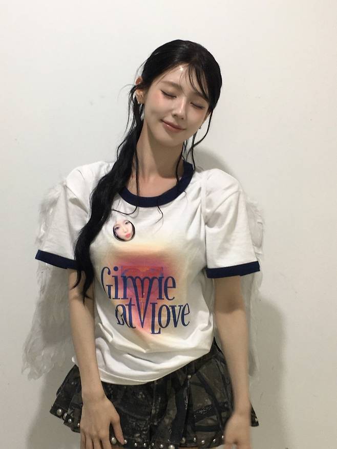 Miyeon, a member of (G)I-DLE, showcased her dazzling beauty by posting recent photos on her social media, featuring a variety of different looks. Miyeon exuded a chic charm by pairing a beige T-shirt with a mini skirt, and she also perfectly pulled off a lovely look using angel wing props.(G)I-DLE, the group Miyeon belongs to, recently made a comeback with the title track Gimme Dat Love from their 9th mini-album *We Made*, garnering immense popularity by topping domestic and international charts and reaching No. 1 on YouTube Trends. Through their fourth world tour, Syncopation, they sold out shows at the Taipei Dome and the Galaxy Arena in Macau, proving their strong ticket-selling power.Additionally, (G)I-DLE is set to take the stage at Lollapalooza, a major U.S. music festival, on August 31 to meet their global fans.