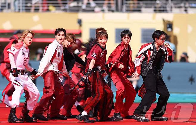 The group BTS appeared at the 2026 FIFA World Cup Final Halftime Show, receiving enthusiastic cheers from audiences around the world. Member Suga left a deep impression by taking the stage wearing an outfit adorned with a Red Devils patch.BTS Bon Voyage graced the stage as a co-headliner alongside Madonna, Shakira, and Justin Bieber at the final held at MetLife Stadium in New Jersey, USA. They heightened the atmosphere by passionately singing their hit song Dynamite, and the entire group, starting with member Jungkook, delivered a high-quality performance.This halftime show was a first in World Cup history, designed to unite the world by combining sports and music. It garnered attention as it was curated by Chris Martin of Coldplay, and BTS Bon Voyage had a meaningful time conveying a message of hope and harmony through music.The members concluded the performance in a peaceful atmosphere, performing the finale together with a childrens choir. Jungkook continued his special connection with the World Cup by taking the stage for the final match, following the opening ceremony of the 2022 Qatar World Cup.