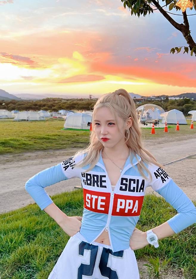 Jeon Hyo-sung, a member of the group Secret, showcased her ever-fresh charm by sharing behind-the-scenes photos from her stage performance on her social media. In the photos taken after her performance at the Andong Super Festa, Jeon Hyo-sung flaunted a radiant summer look and visuals that rival those of active idols.In the released photos, Jeon Hyo-sung showcased a refreshing look by pairing a white top with a blue jacket, perfectly pulling off her bleached blonde hair and colored contact lenses. Her youthful appearance, which makes it hard to believe she is 36, drew an enthusiastic response from fans.Meanwhile, Jeon Hyo-sung made a comeback with Secret—her first in 12 years—alongside Jung Ha-na and Ye-bin on the 18th, releasing the special mini-album Secret Flavor and continuing her promotional activities.