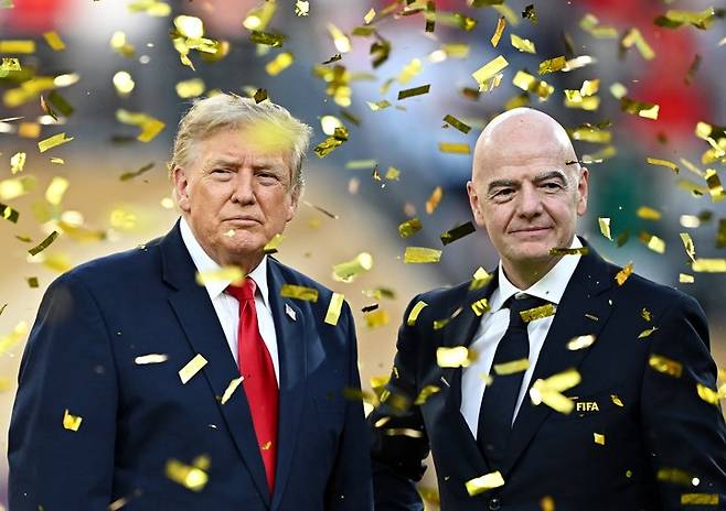 Soccer Football - FIFA World Cup 2026 - Final - Spain v Argentina - New York/New Jersey Stadium, East Rutherford, New Jersey, U.S. - July 19, 2026 U.S. President Donald Trump and FIFA President Gianni Infantino during the trophy presentation after the match REUTERS/Dylan Martinez