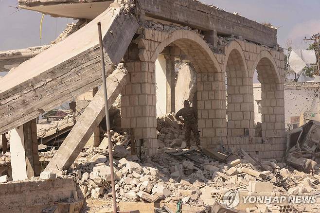 이스라엘 공격으로 무너진 레바논 남부의 건물 [AFP=연합뉴스자료사진 재판매 및 DB 금지]