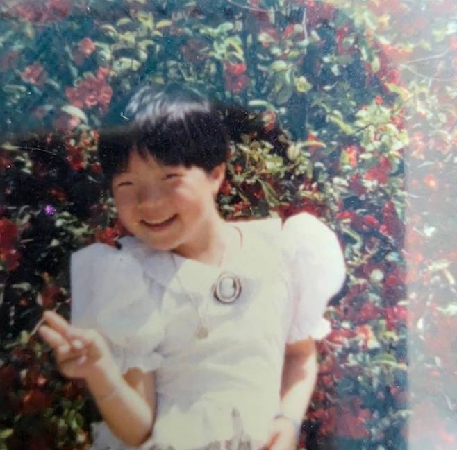 Comedian Ahn Young-mi has shared photos from her childhood.On the 17th, Ahn Young-mi posted several old photos on her social media account with the caption, I can finally see Dads tired expression.The photos reveal Ahn Young-mis appearance during her childhood. From her short bob haircut and playful expression to her bright smile, her cheerful charm, which resembles her current look, catches the eye.In particular, one photo shows a young Ahn Young-mi smiling innocently while being held in her fathers arms. In contrast, the father holding his daughter wears a somewhat exhausted expression, eliciting laughter.Ahn Young-mi also drew attention by commenting, I can finally see Dads tired expression, only after looking at the photos again long after they had passed. The contrast between her mischievous childhood appearance—which hints at the formidable difficulty of parenting just from the photos—and her fathers expression evokes both laughter and a touching sentiment.Meanwhile, Ahn Young-mi married a non-celebrity working at a foreign company in 2020 and has been leading a long-distance marriage, traveling back and forth between Korea and the United States. She gave birth to her first son in the U.S. in 2023 and welcomed her second son in Seoul last June.Photo = Ahn Young-mis account