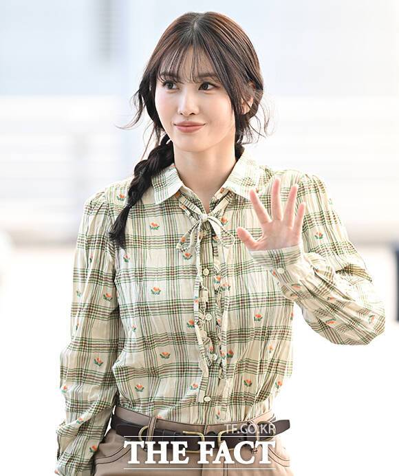 Momo of the group TWICE is departing from Incheon International Airport in Jung-gu, Incheon, on the morning of the 21st to attend the Onitsuka Tiger fashion show.Photo & Video Planning Department