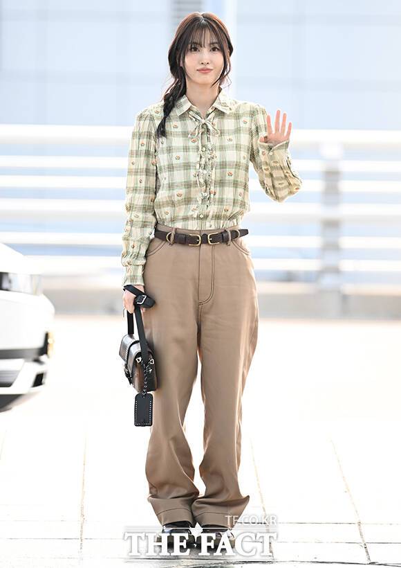 Momo of the group TWICE is departing from Incheon International Airport in Jung-gu, Incheon, on the morning of the 21st to attend the Onitsuka Tiger fashion show.Photo & Video Planning Department