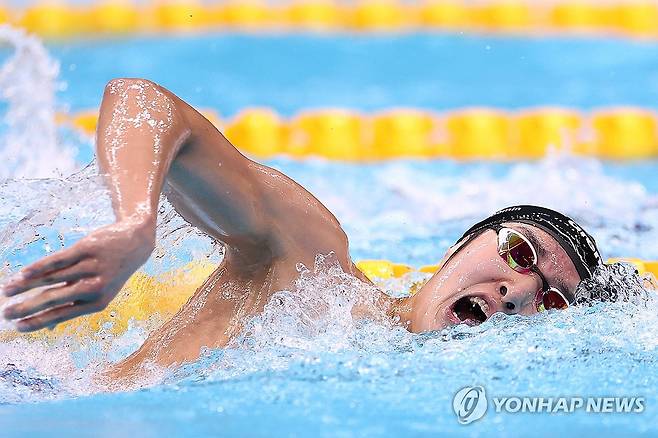 역영하는 김우민 (도쿄=연합뉴스) 윤동진 기자 = 22일 도쿄 아쿠아틱스 센터에서 열린 2026 아이치·나고야 아시안게임 수영 남자 1500m 자유형 결승. 한국 김우민이 역영하고 있다. 2026.9.22 mon@yna.co.kr