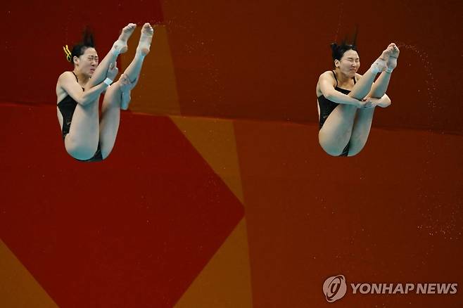 김수지와 김나현의 환상 연기 [AFP=연합뉴스]