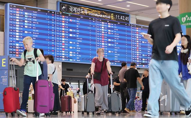 북적이는 인천국제공항 제1여객터미널 [연합뉴스 제공]