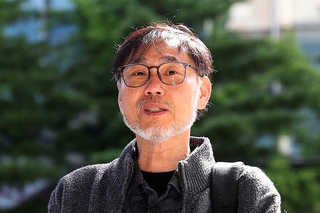 김순환 서민민생대책위원회 사무총장이 지난달 11일 오전 서울 영등포경찰서에서 취재진 질문에 답하고 있다. 뉴시스