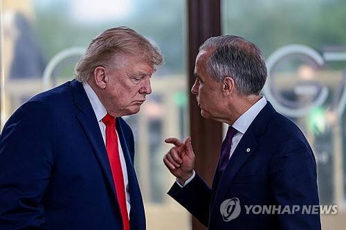 도널드 트럼프 미국 대통령과 마크 카니 캐나다 총리 [로이터=연합뉴스 자료사진. DB 및 재판매 금지]