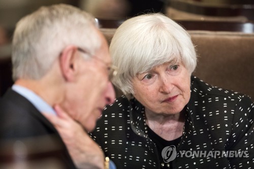 epa06177237 Chair of the Federal Reserve Janet Yellen (R) chats with Vice Chair Stanley Fischer (L) after an open meeting of the Board of Governors at the Federal Reserve in Washington, DC, USA, 01 September 2017. The board met to discuss 'a final rule imposing restrictions on the qualified financial contracts (QFCs) of US global systemically important banking organizations (GSIBs) and the US operations of foreign GSIBs.'  EPA/JIM LO SCALZO