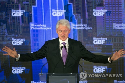 Former U.S. President Bill Clinton speaks at the Bloomberg Global Business Forum, Wednesday, Sept. 20, 2017, in New York. (AP Photo/Mark Lennihan)