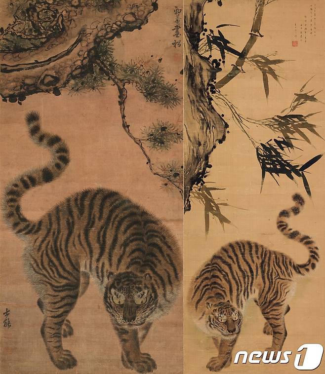 (왼쪽)'소나무 아래 호랑이'(松下猛虎圖), 김홍도金弘道(1745~1806년경), 조선, 18세기, 비단에 먹과 옅은 색, 90.3×43.8cm, 삼성미술관 리움 소장 (오른쪽)'대나무 아래 호랑이'(竹下猛虎圖), 김홍도金弘道(1745~1806년경), 임희지林熙之(1765~1820년 이후), 조선, 19세기 초, 비단에 먹과 옅은 색, 91.0×34.0cm, 개인 소장 © News1
