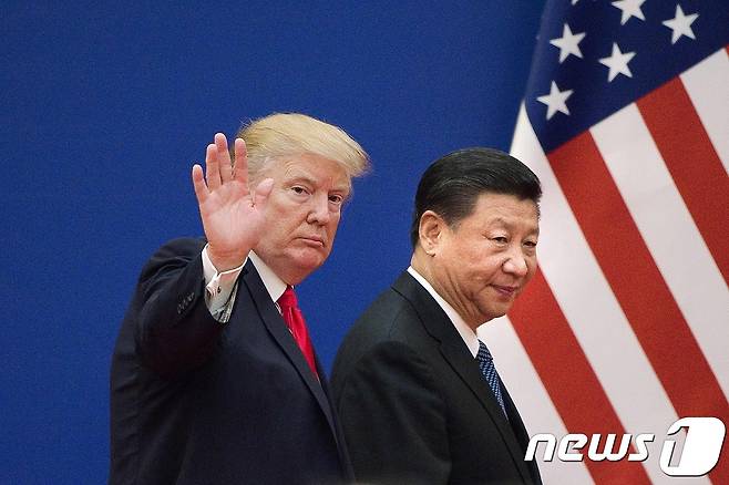 지난 해 11월 방중한 도널드 트럼프 미 대통령과 시진핑 중국 주석.  © AFP=뉴스1