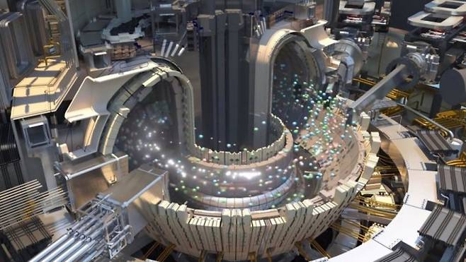 국제핵융합실험로(ITER) 토카막 내부 상상도. 실제로는 도넛 모양의 밀폐된 진공용기에 플라즈마 상태의 입자들이 갇힌다. 고에너지 중성자를 충돌시켜 열을 내는 중성입자빔가열장치(NBI) 등으로 플라즈마를 평균 1억5000만 ℃까지 가열해 핵융합 반응을 유도한다. - 자료: ITER 국제본부
