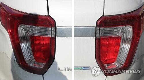 차량 부순 차주가 주장하는 결함 흔적 (전주=연합뉴스) 정경재 기자 = 20일 오후 전북 전주시 덕진구 포드 자동차 전시관 앞에서 "중고차를 신차로 속여 팔았다"며 차량을 부순 차주가 주장하는 결함 흔적. 차량 트렁크 왼쪽과 오른쪽의 간격이 서로 다르다. 2019.1.20 jaya@yna.co.kr