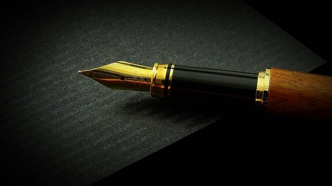 내가 서명만 하는 사람인가!