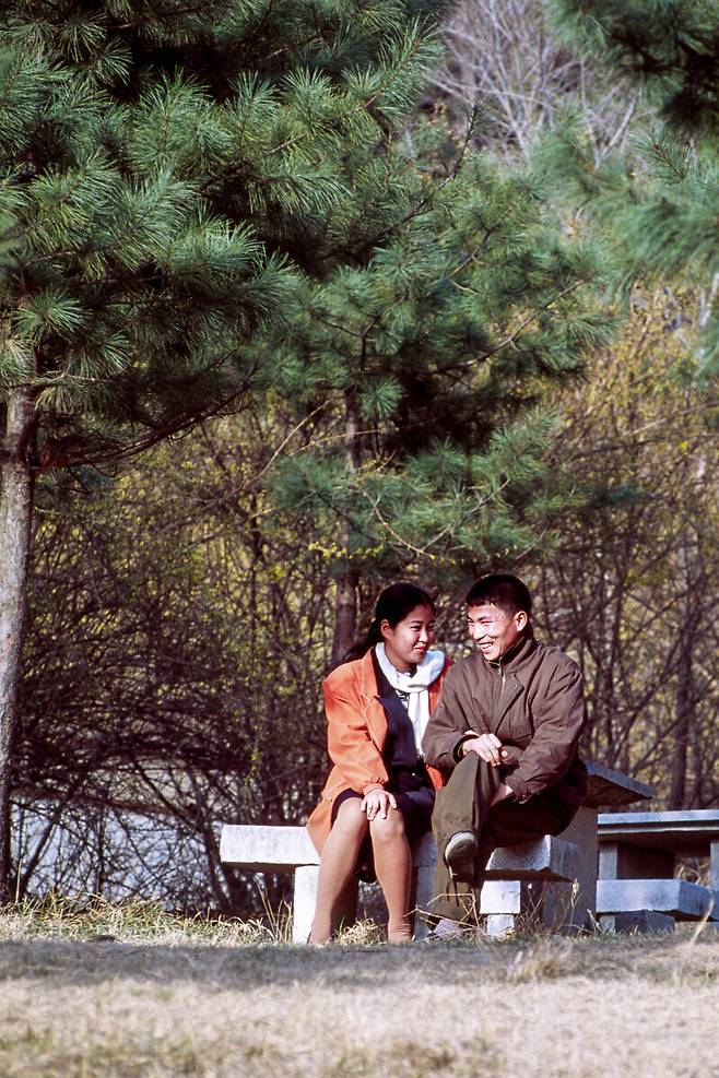 A young couple on a date in a park