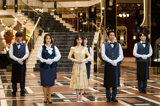 A scene from tvN's hit drama series ″Hotel Del Luna,″ featuring IU, center. [TVN]