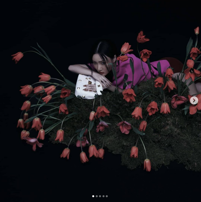 A fascinating pictorial of Singer Hwasa has been released.Hwasa posted a pictorial cut with Vogue Korea on her SNS on the 1st, in which Hwasa showed off her more radiant charisma in front of a black background with flowers.Reclining in pendulum-colored costumes between red tulips, another photo posed in a black costume with white magnolia adorned.The glamorous yet elegant figure of Hwasa caught the eye.Meanwhile, Hwasa, who was greatly loved by Solo album Maria last year, released her new song Play with Life on January 29 this year.Photo Sources HwasaSNS