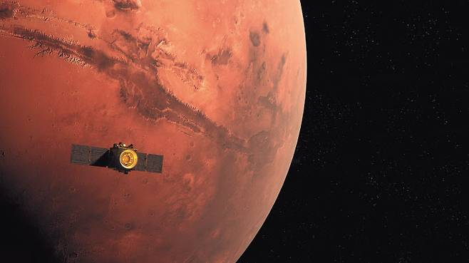 아랍권 최초의 화성 탐사선 ‘아말’이 지난 9일 화성에 접근해 궤도에 진입하고 있다. [EPA]