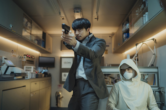 Gi-heon, played by Gong Yoo, is an ex-agent of the intelligence bureau on his last mission to transport Seobok, played by Park Bo-gum, the world's first-ever human clone, to safety. [CJ ENM]