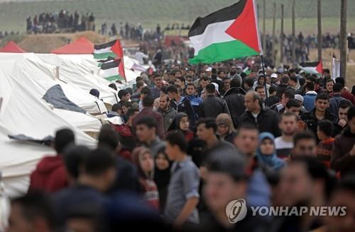 2018년 '땅의 날'을 맞아 팔레스타인 가자지구에서 열린 대규모 시위 [EPA=연합뉴스 자료사진]