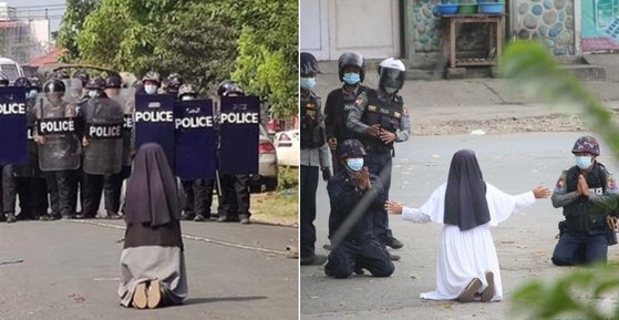 미얀마 북부 카친주 미치나 지역에서 안 로사 누 따웅(45) 수녀가 진압 경찰 앞에 두 차례 무릎을 꿇고 시위대를 쏘지 말아달라고 비는 모습. [SNS 갈무리]