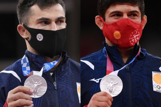 도쿄올림픽 유도 은메달리스트 조지아 선수 바자 마르그벨라슈빌리(왼쪽)와 라샤 샤브다투시빌리. AP·AFP=연합뉴스